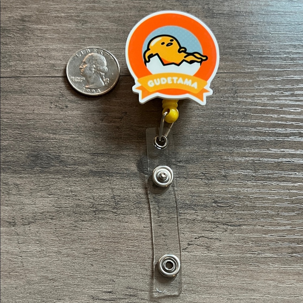 Gudetama badge reel